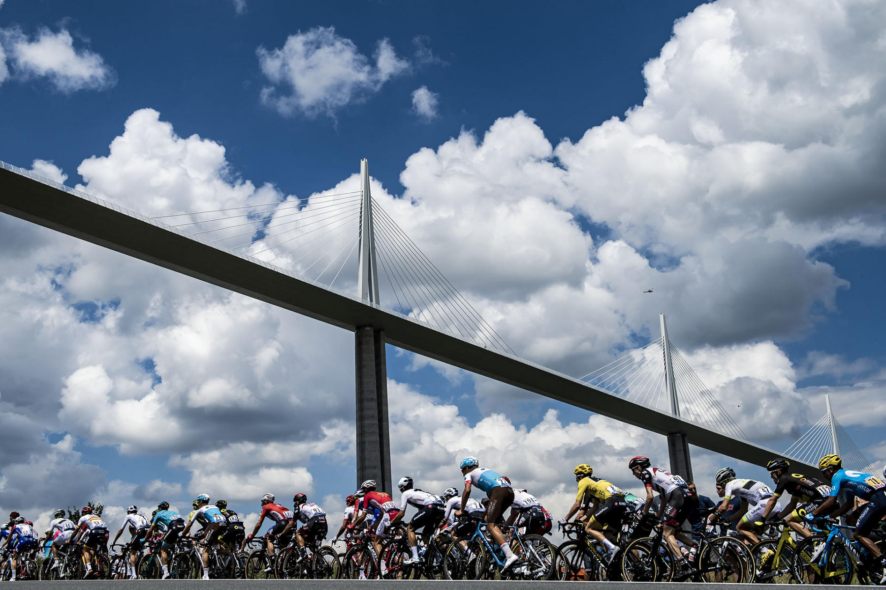 Tour de France - Stage Fifteen - The peloton rides under the Millau Viaduct