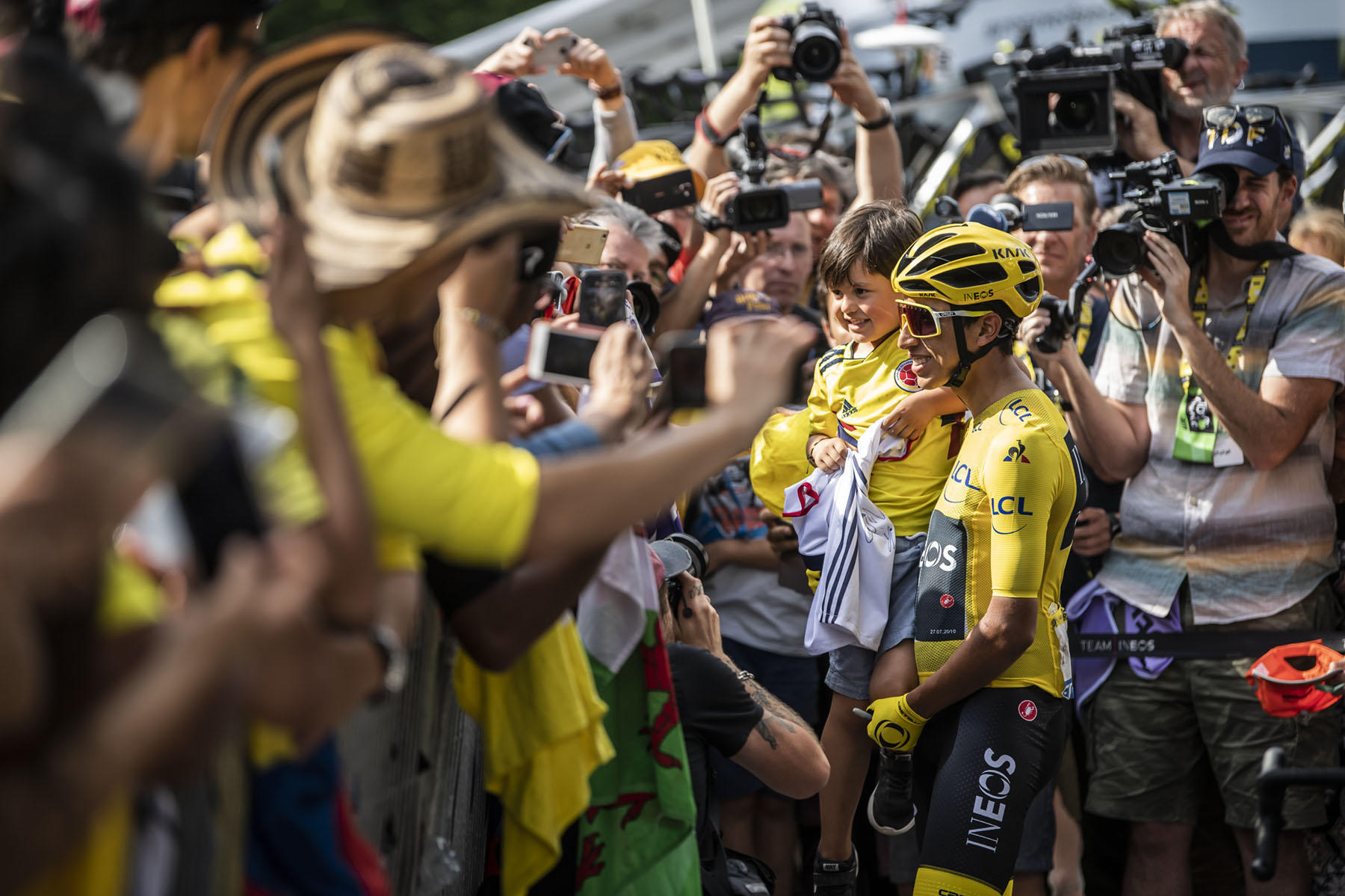 Tour de France 2019 - Stage Twenty One - Egan Bernal celebrates with fans