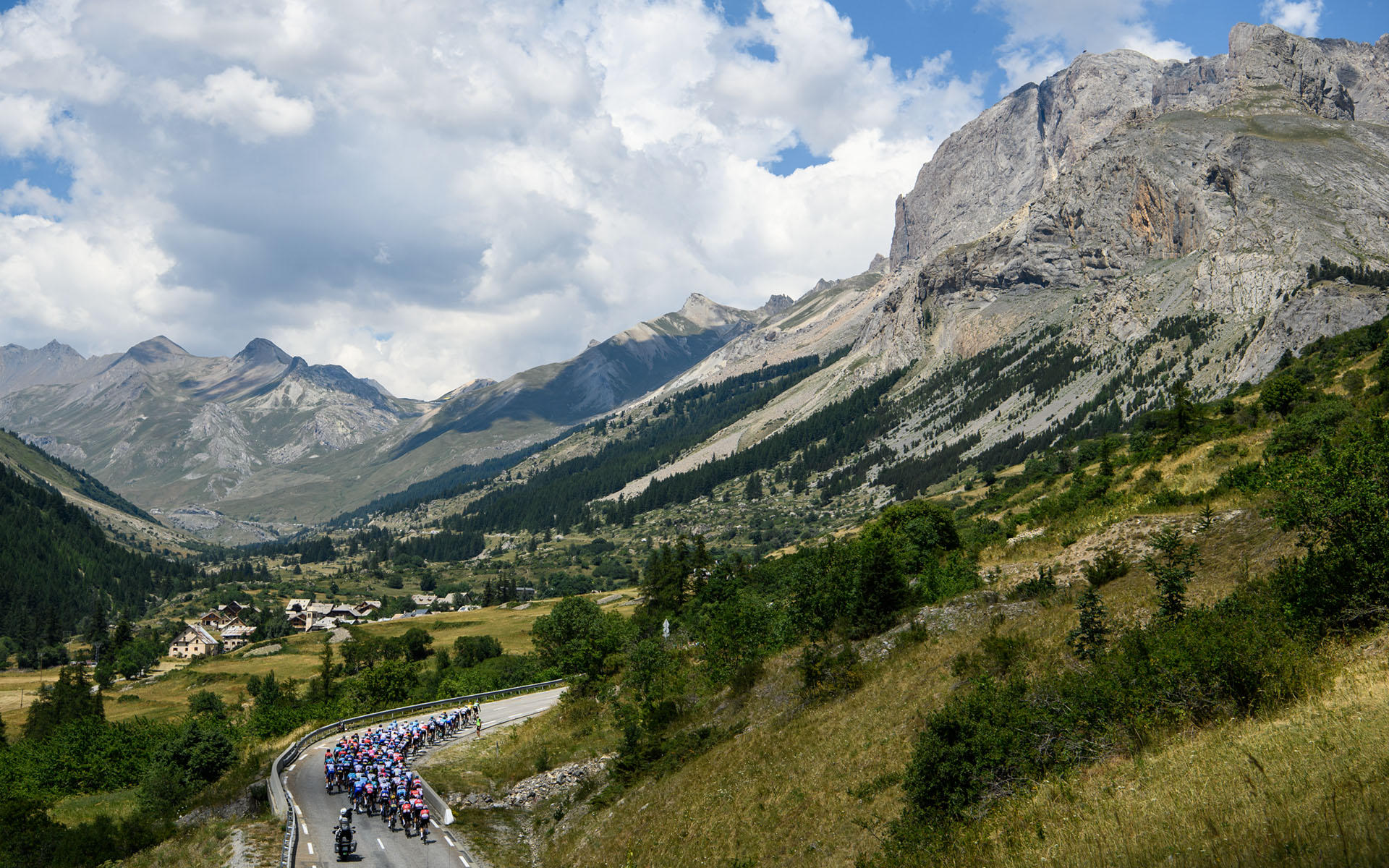 Tour de France 2022 - Stage 12 - The Peloton climbs towards Le Monêtier les Bains